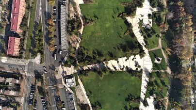 Urban planning project site with roads green areas and residential buildings