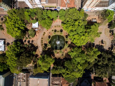 Sustainable urban planning with green spaces and eco-friendly buildings in a city layout